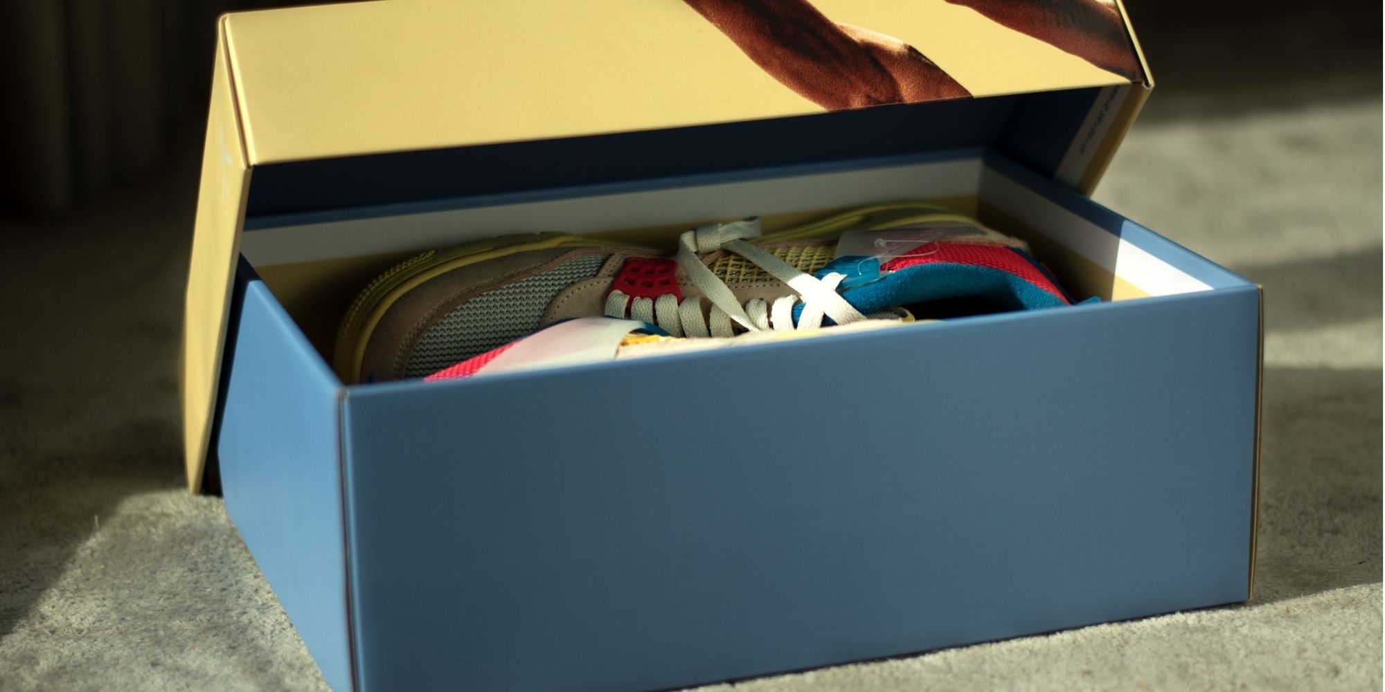 image of multicolored shirts on a clothing rack