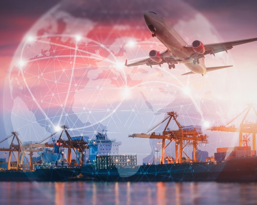 A fully stacked and secured pallet of boxes of books in a warehouse, showing proper shrink wrapping and strapping