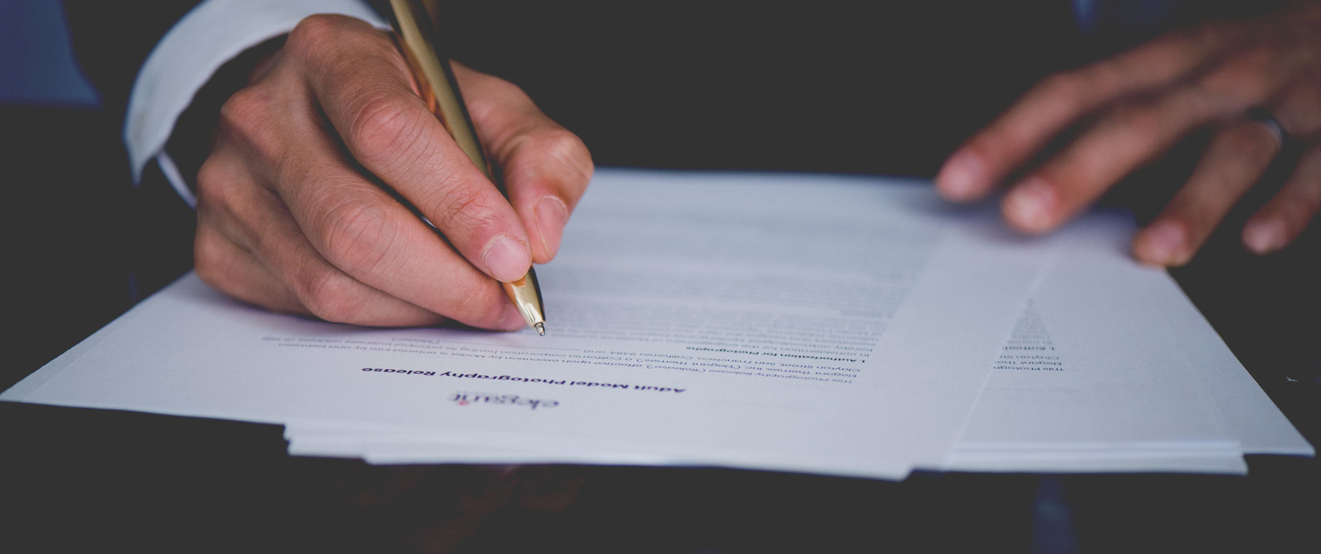 eFulfillment Service Male In Suit Signing Contract